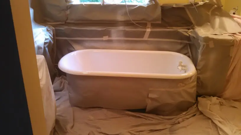 Same bathtub after professional refinishing with a smooth white gloss finish in Southeast Michigan