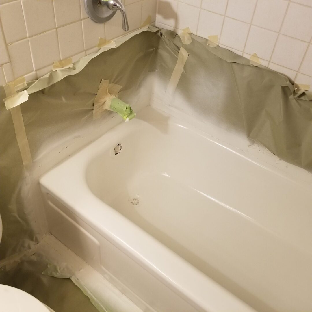 Refinished bathtub with a smooth even finish after repair by Absolutely Smooth Bathtubs